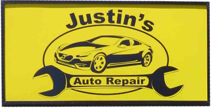 The sign for Justin's Auto